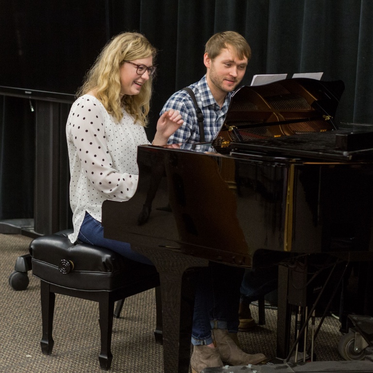 Students playing music in classroom chamber